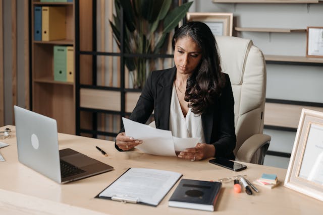 woman examining files