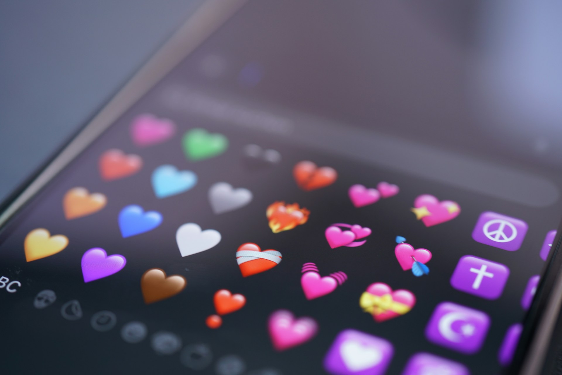 keyboard with heart emojis