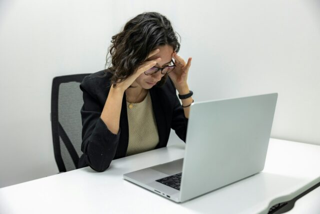 stressed woman at computer