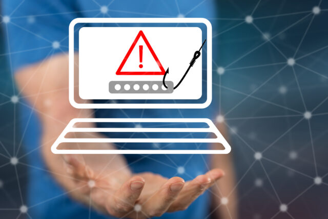 Phishing concept above the hand of a man in background